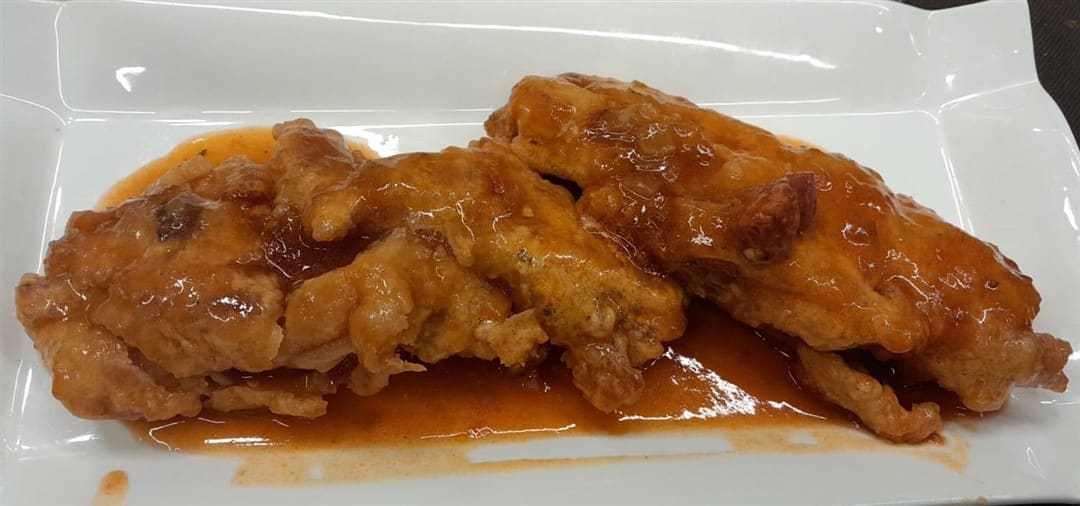 Manitas de cerdo en salsa